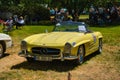 BADEN BADEN, GERMANY - JULY 2022: lemon yellow Mercedes-Benz 300 SL W198 1957 cabrio roadster, oldtimer meeting in Kurpark Royalty Free Stock Photo