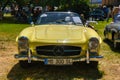BADEN BADEN, GERMANY - JULY 2022: lemon yellow Mercedes-Benz 300 SL W198 1957 cabrio roadster, oldtimer meeting in Kurpark Royalty Free Stock Photo