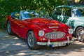 BADEN BADEN, GERMANY - JULY 2022: red AUSTIN HEALEY 3000 MK III 3 MK3 1963 cabrio roadster, oldtimer meeting in Kurpark