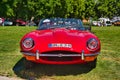 BADEN BADEN, GERMANY - JULY 2022: red 1961 Jaguar E-Type 3.8 Flat Floor Roadster cabrio, oldtimer meeting in Kurpark