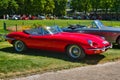 BADEN BADEN, GERMANY - JULY 2022: red 1961 Jaguar E-Type 3.8 Flat Floor Roadster cabrio, oldtimer meeting in Kurpark