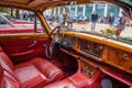 BADEN BADEN, GERMANY - JULY 2019: red leather wooden interior of JAGUAR MARK X 420G 1961 1970 sedan limousine, oldtimer meeting in Royalty Free Stock Photo