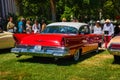 BADEN BADEN, GERMANY - JULY 2022: red Lincoln Premiere 1956, oldtimer meeting in Kurpark Royalty Free Stock Photo