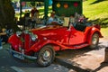 BADEN BADEN, GERMANY - JULY 2022: red MG TD 1951 cabrio roadster, oldtimer meeting in Kurpark