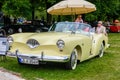 BADEN BADEN, GERMANY - JULY 2019: white beige KAISER DARRIN cabrio roadster 1954, oldtimer meeting in Kurpark