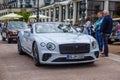 BADEN BADEN, GERMANY - JULY 2019: white BENTLEY CONTINENTAL GT GTC second generation cabrio roadster 2015, oldtimer meeting in