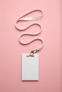 Badge name tag, business conference pass. Event lanyard mockup on pink background Royalty Free Stock Photo