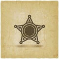 Badge with star on vintage background Royalty Free Stock Photo