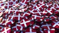 Pile of badges featuring flags of Denmark. 3D rendering
