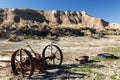 Badlands desert hills landscape rusty wheels Royalty Free Stock Photo