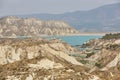 Badlands landscape and blue waters in Algeciras reservoir. Spain