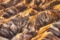 Badlands view from Zabriskie Point in Death Valley National Park at Sunset