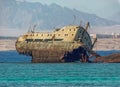 A badly corroded shipwreck of a beach at a beach at Sharm El Sheik, Egypt Royalty Free Stock Photo