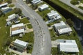 Badly damaged mobile homes after hurricane Ian in Florida residential area. Consequences of natural disaster