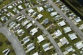 Badly damaged mobile homes after hurricane Ian in Florida residential area. Consequences of natural disaster