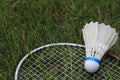 Badminton Birdie Shuttlecock Racket On Green Grass Royalty Free Stock Photo