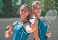 Badminton player friends, outdoor in summer with racket and smile on court for training, exercise or game. Women team Royalty Free Stock Photo