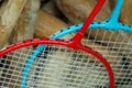 Badminton rackets in a box with wooden croquet mallets Royalty Free Stock Photo