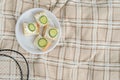 Badminton rackets and summer sandwiches for summer family sport picnic, top view. Royalty Free Stock Photo