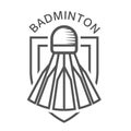 Badminton shuttlecock over shield, stylized badminton emblem or blazon