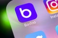 Badoo application icon on Apple iPhone X screen close-up. Badoo app icon. Badoo is an online social media network. Social media