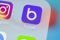 Badoo application icon on Apple iPhone X screen close-up. Badoo app icon. Badoo is an online social media network. Social media