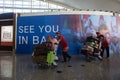 BADUNG,BALI/INDONESIA-June 25 2018:Porters bring passenger suitcases to departure terminal