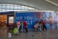 BADUNG,BALI/INDONESIA-June 25 2018:Porters bring passenger suitcases to departure terminal