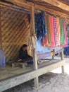 BADUY VILLAGE/INDONESIA - SEPTEMBER 27, 2014: Baduy women weaving traditional cloth