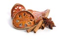 Slices of dried bael fruit and cinnamon sticks, stars of badjan anise Royalty Free Stock Photo