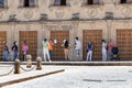 Baeza, Jaen, Spain - June 20, 2020: A group of unknown tourists with a professional tourist guide visiting the old city of Baeza