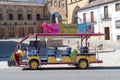 Baeza, Jaen, Spain - June 20, 2020: Tourists Electrical mini bus in the Square of Populo Plaza del Populo, Baeza on summer day,