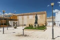 Baeza, Spain - 5/7/18: Courtyard with statue next to Church Of Santa Cruz.