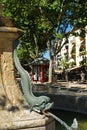 Large stone fish fountain in the Plaza de la Constitucion, Baeza, Spain.