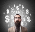 Baffled man and dollar signs on blackboard