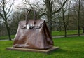Giant handbag made of steel. Artwork sculpture.