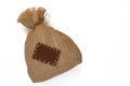 Bag of burlap with a patch on white background