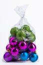 Bag with christmas balls on white with clipping path