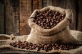 Bag of coffee beans is sitting on a table Royalty Free Stock Photo