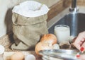 Bag of flour, eggs and onion on table Royalty Free Stock Photo