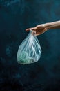 bag with garbage in hands. Selective focus Royalty Free Stock Photo