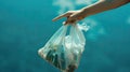 bag with garbage in hands. Selective focus Royalty Free Stock Photo