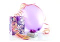 Bag with gift, balloon and party streamer Royalty Free Stock Photo