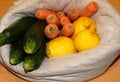 bag of organic fruits and vegetables zucchini carrots and lemon for sale Royalty Free Stock Photo