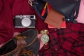 bag, passport, camera, compass, shoes, shirt, note pad on pink wooden background Royalty Free Stock Photo