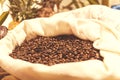 Bag of roasted coffee beans on the market in South America. Vintage Toning Effect Royalty Free Stock Photo