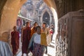 Burmese monks entering a Buddhist temple in Bagan