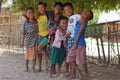 Bagan Burma, Myanmar November 11, 2012. Portrait of six happy smiling Burmese boys different age in colorful clothes