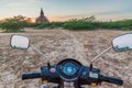 BAGAN, MYANMAR - DECEMBER 7, 2016: E-bike (electric scooter) on a dirt trail in Bagan, Myanm Royalty Free Stock Photo