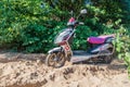 BAGAN, MYANMAR - DECEMBER 6, 2016: E-bike electric scooter on a sand trail in Bagan, Myanm Royalty Free Stock Photo